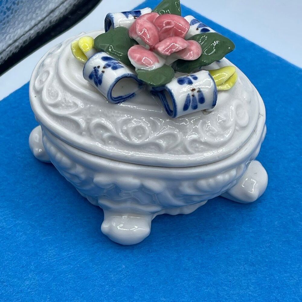 Egg shaped oval 3D floral ribbon porcelain trinket box jewelry